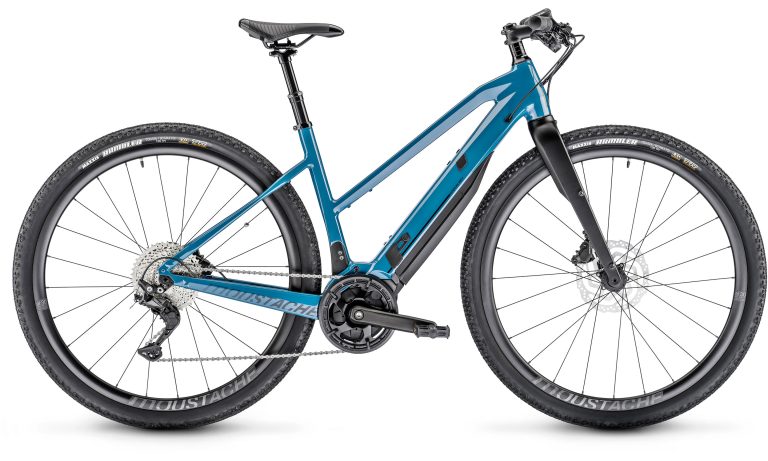 Moustache Dimanche 29.2 Gravel Open 2023, vélo de trekking électrique bleu pétrole, vue de profil